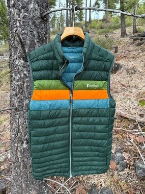 cotopaxi Forest Green Quilted Vest with Orange, Blue & Lime Stripes Men’s L vest